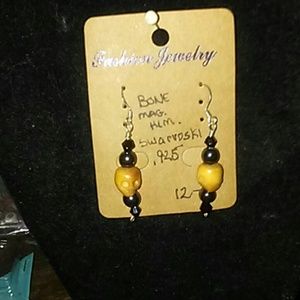 Yellow skull and black stone hanging earrings